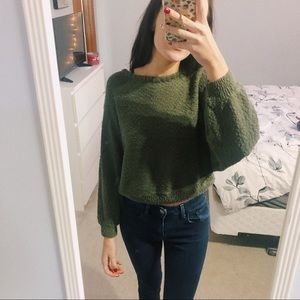 green sweater